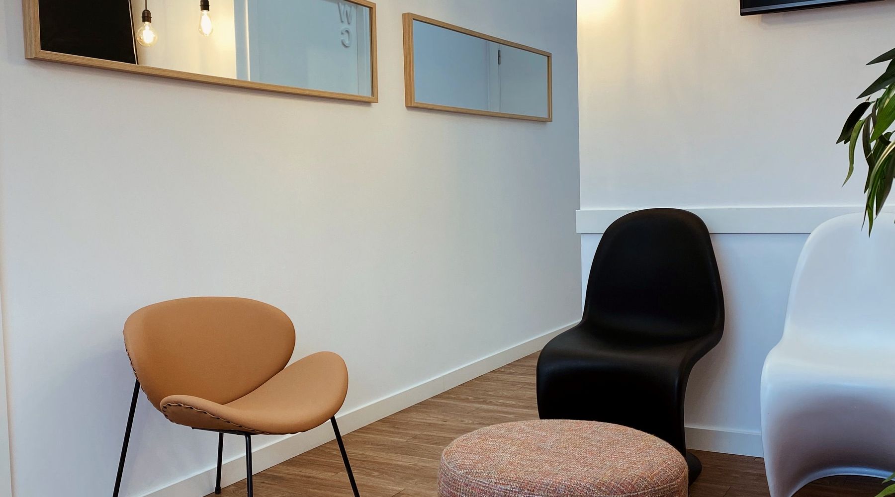A calm interior with soft seating and warm neutral finishes