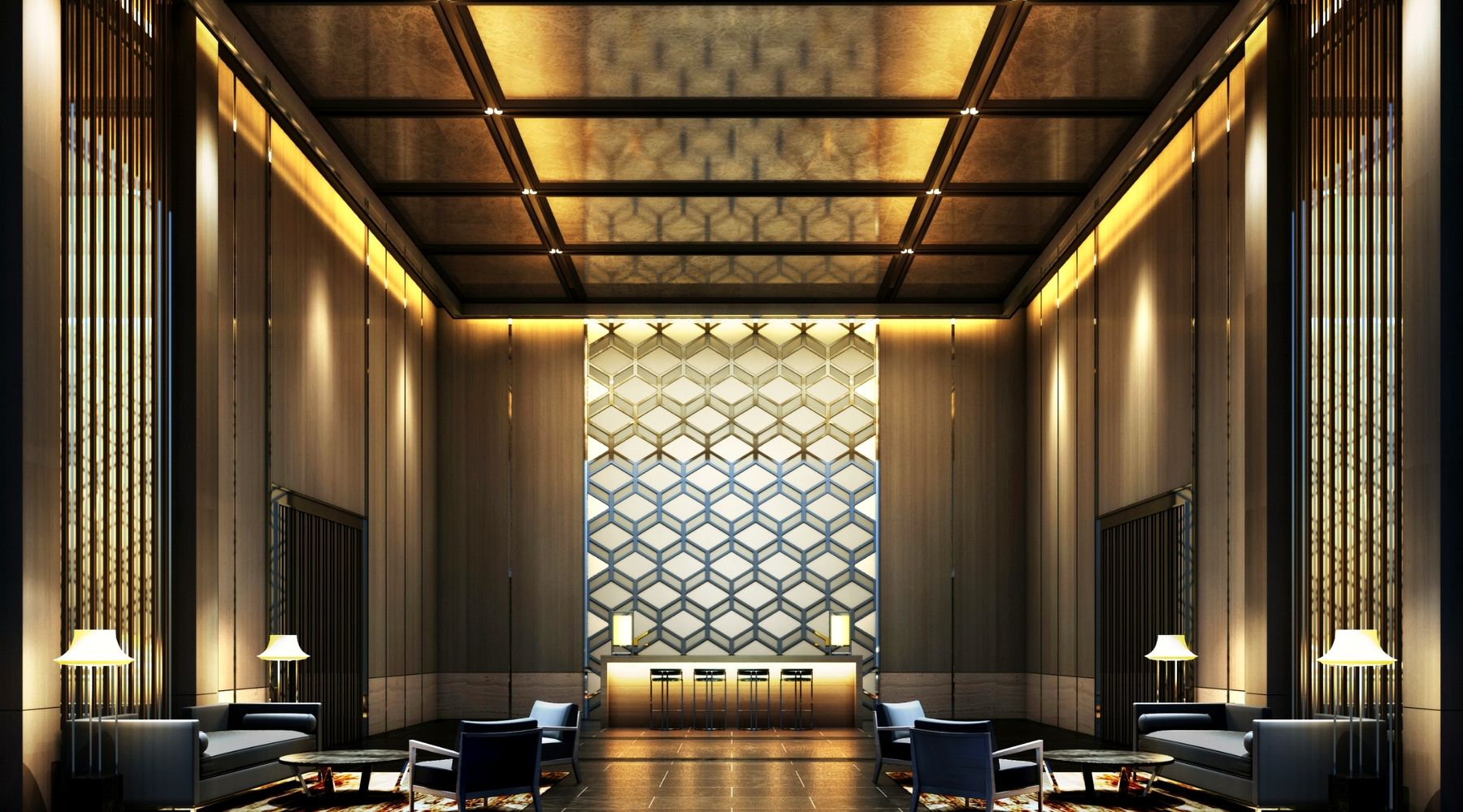 A hotel lobby with warm lighting and quiet seating